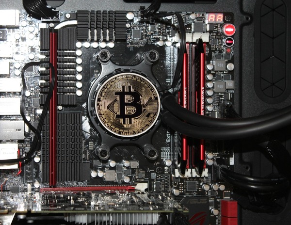 Bitcoin coin on a computer motherboard