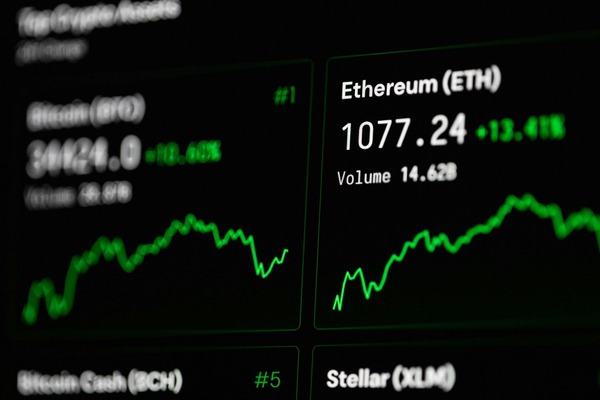 Crypto price tickers on a dark screen