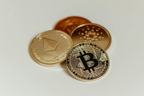 Gold Ethereum Cardano and Bitcoin coins