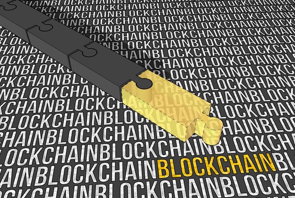 Gold key on a blockchain text background
