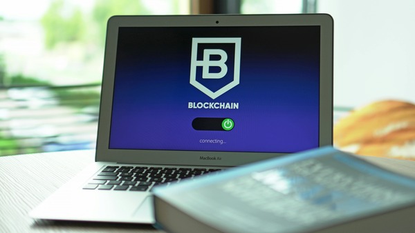 Laptop with a blockchain app on screen