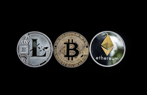 Litecoin Bitcoin and Ethereum coins in a row