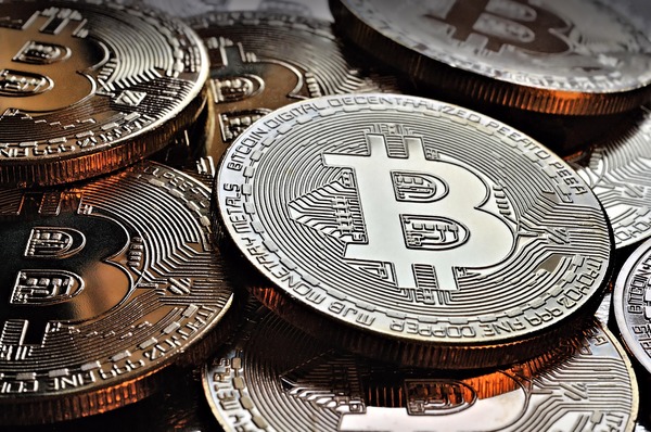 Pile of silver Bitcoin coins